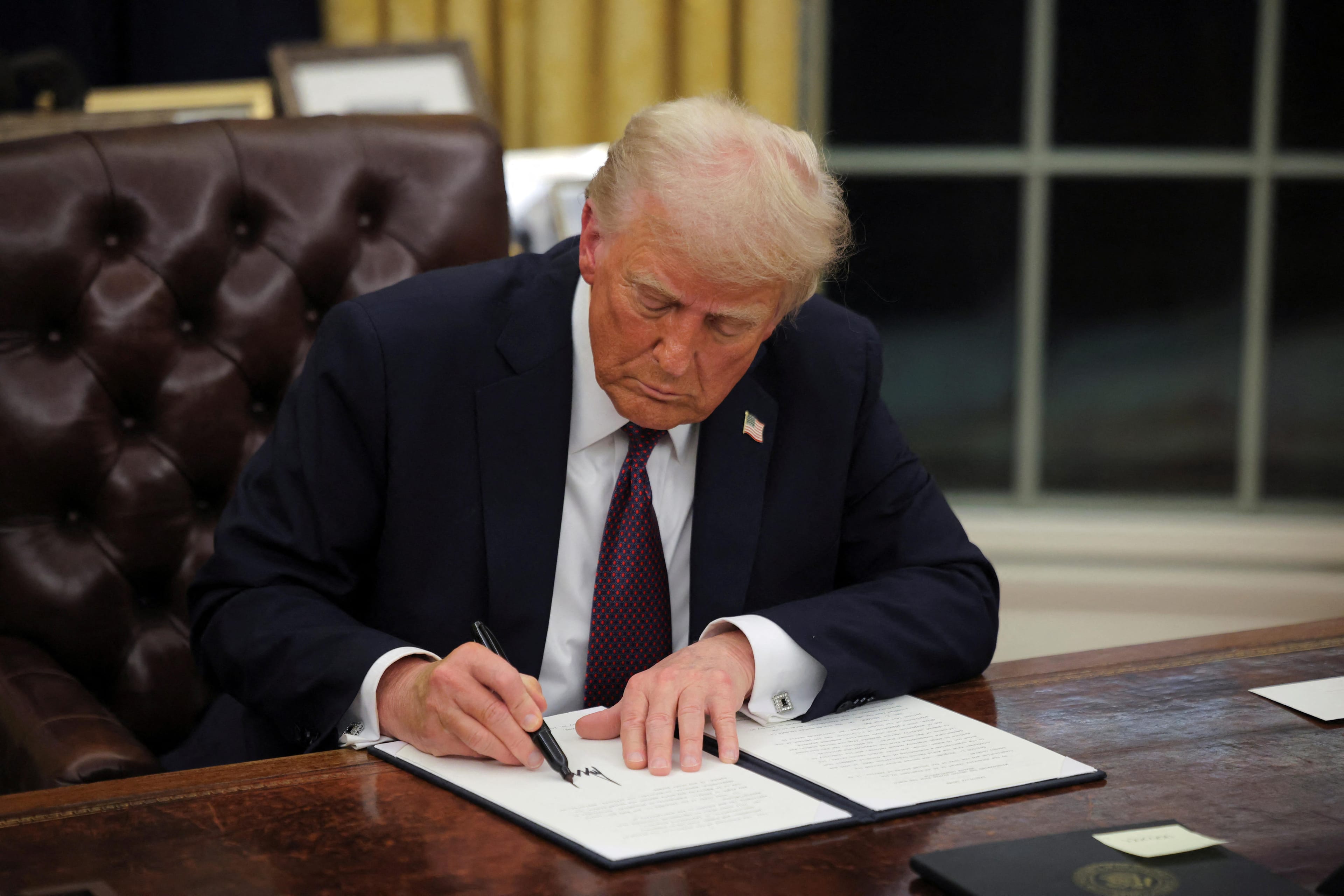 How many pieces of legislation will Trump sign into law in April?