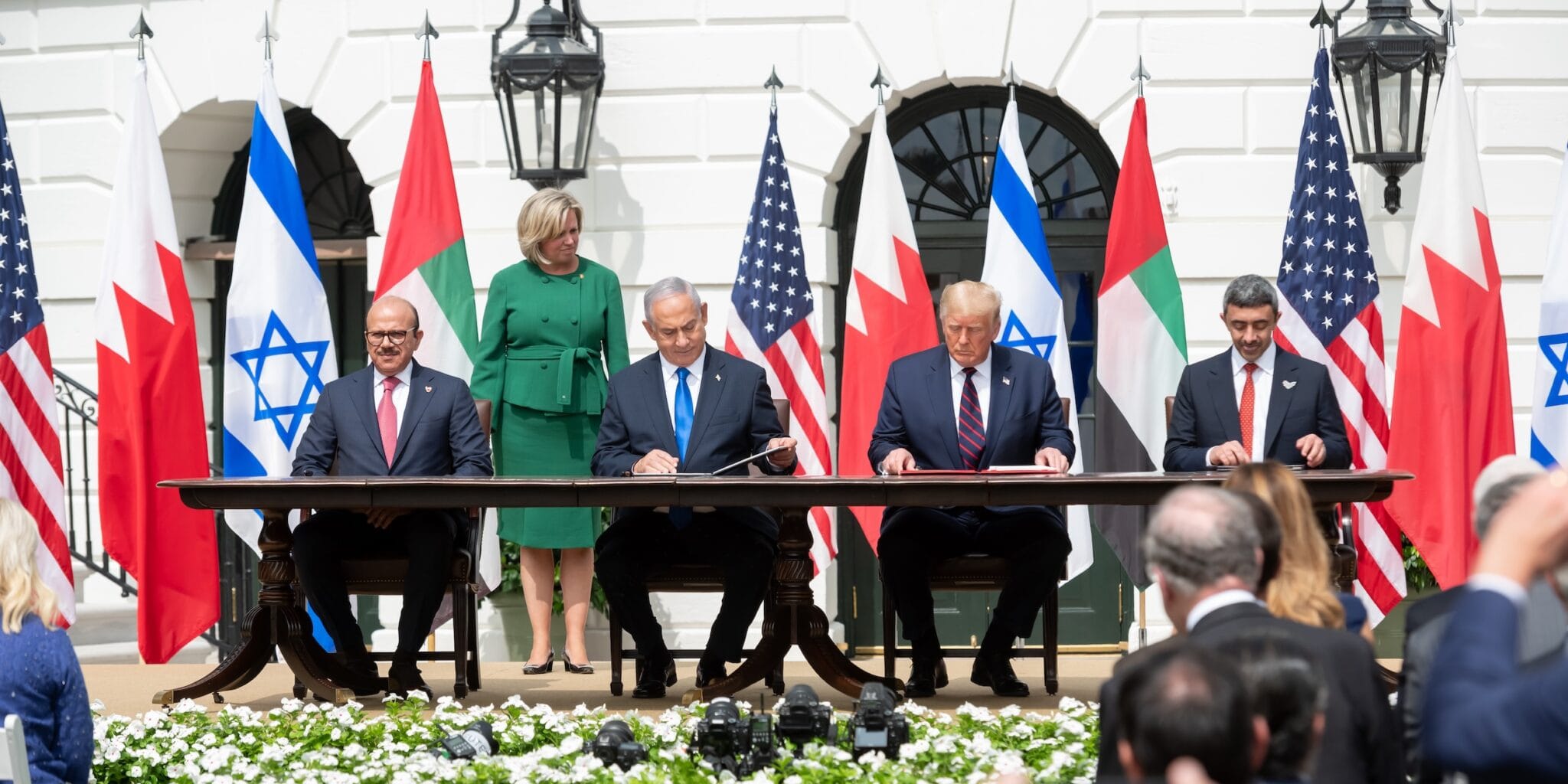 Will a new country join the Abraham Accords by March 31?